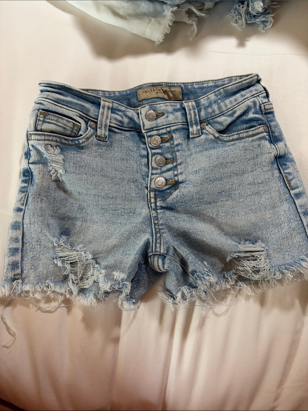 Celebrity Pink Light Wash Distressed Denim Shorts